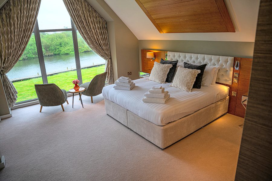 Master bedroom at yare view house with river views